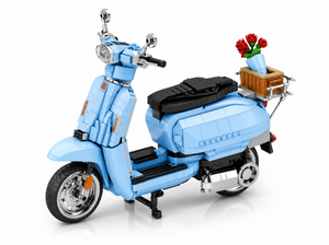 Blue Innocenti Lambretta V200 scooter with flower bouquet