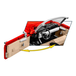 Geöffnete Tür des roten Citroen DS 19 Decapotable Cabrio Klemmbausteinmodells von COBI 24346 mit braunem Innenraum und bedrucktem Amaturenbrett und einspeichigem Lenkrad und charakteristischer Frontscheibe